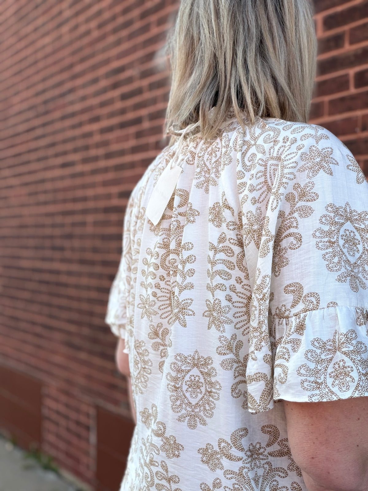 The Poppy Lane Flutter Sleeve Ruffle V Neck Blouse