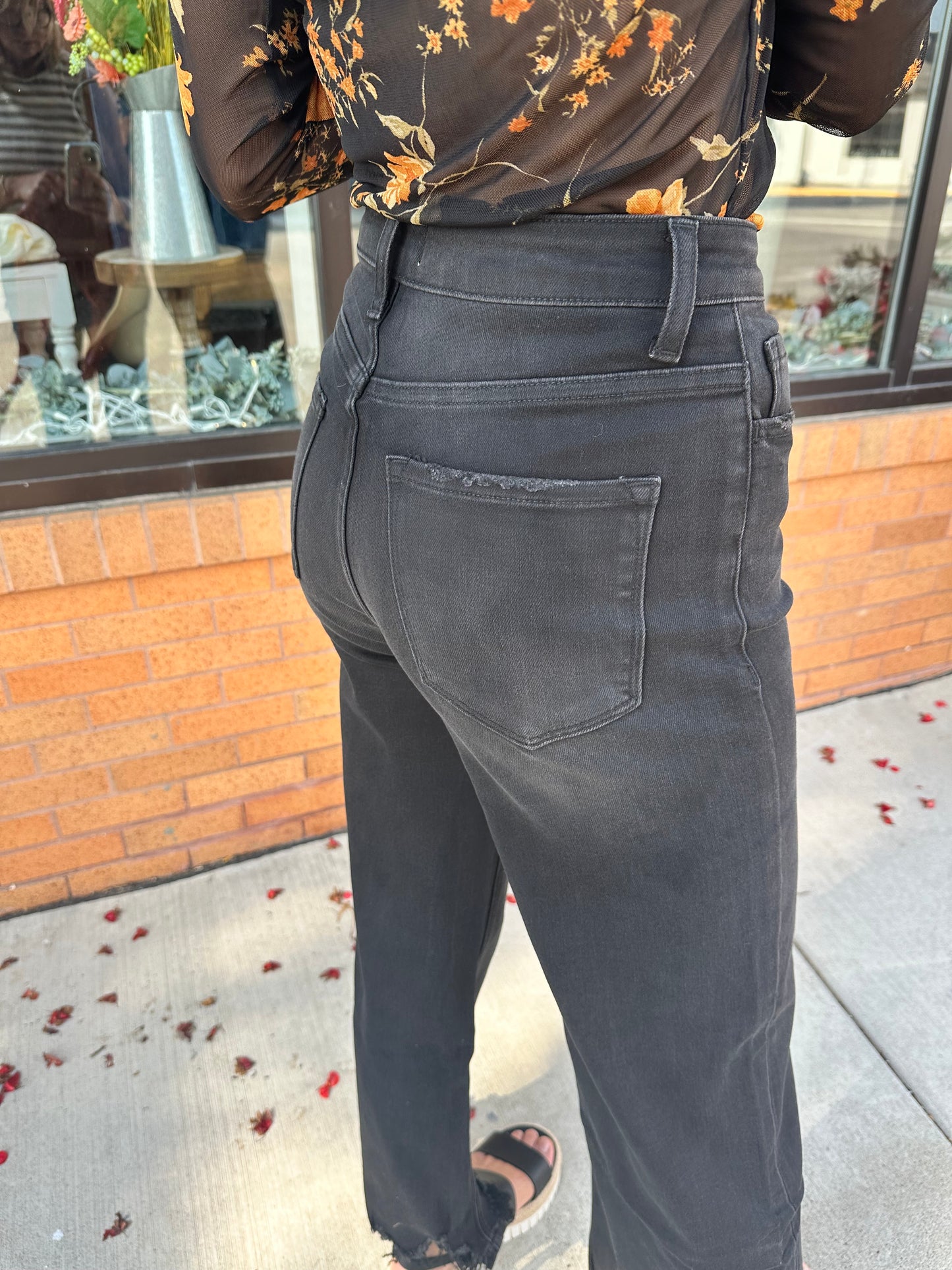 The Lena Asymmetrical Distressed Hem Straight Leg Jeans