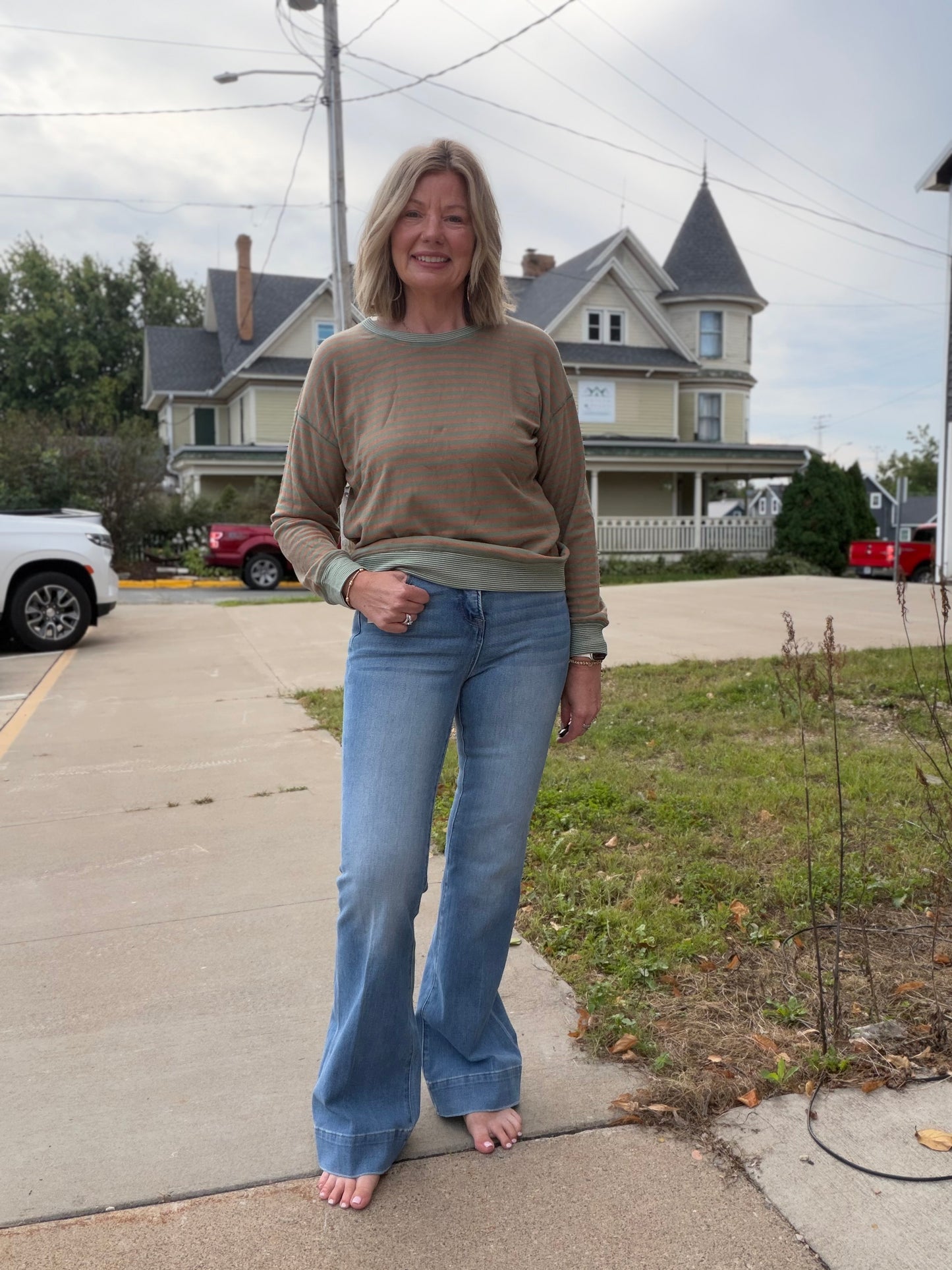The Stella Mid Rise Tummy Control 4 Way Stretch Flare Jeans by Risen