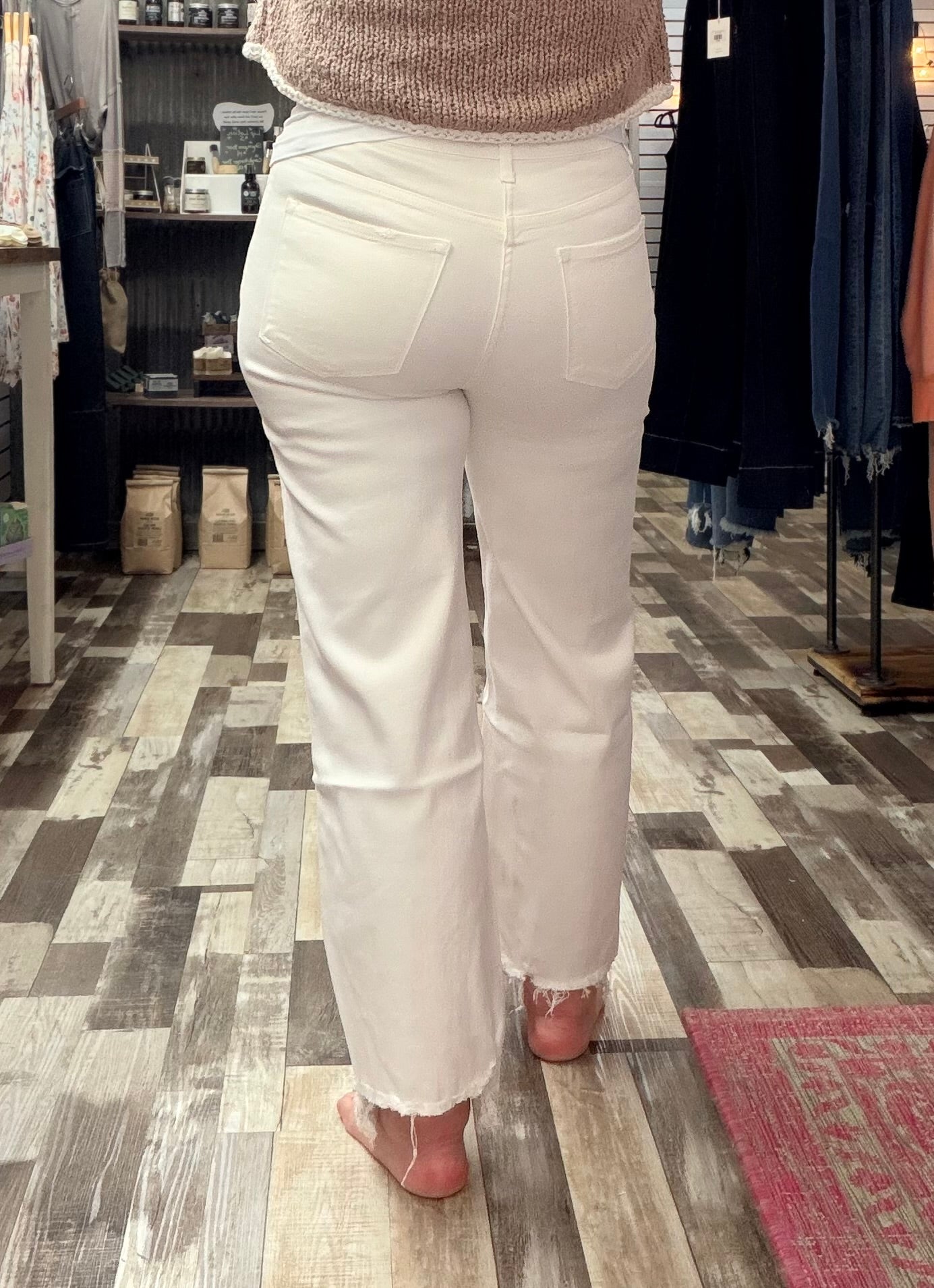 The Lena Asymmetrical Distressed Hem Straight Leg Jeans