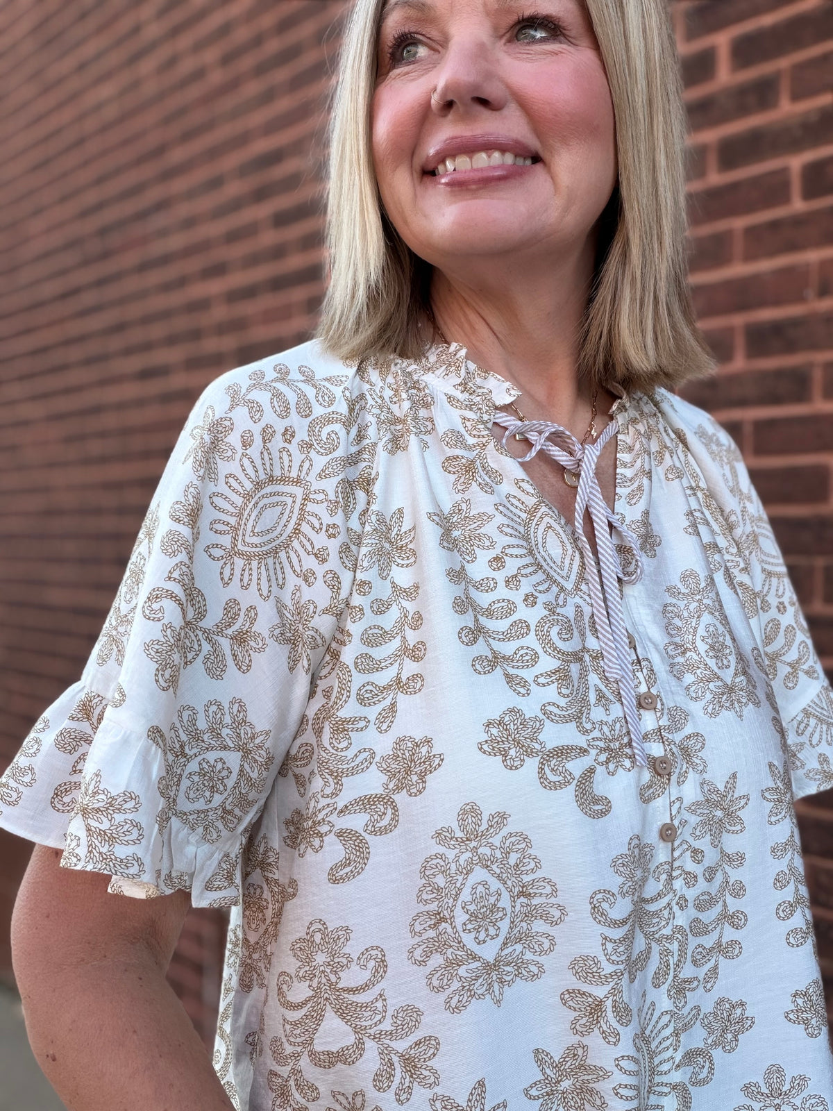 The Poppy Lane Flutter Sleeve Ruffle V Neck Blouse