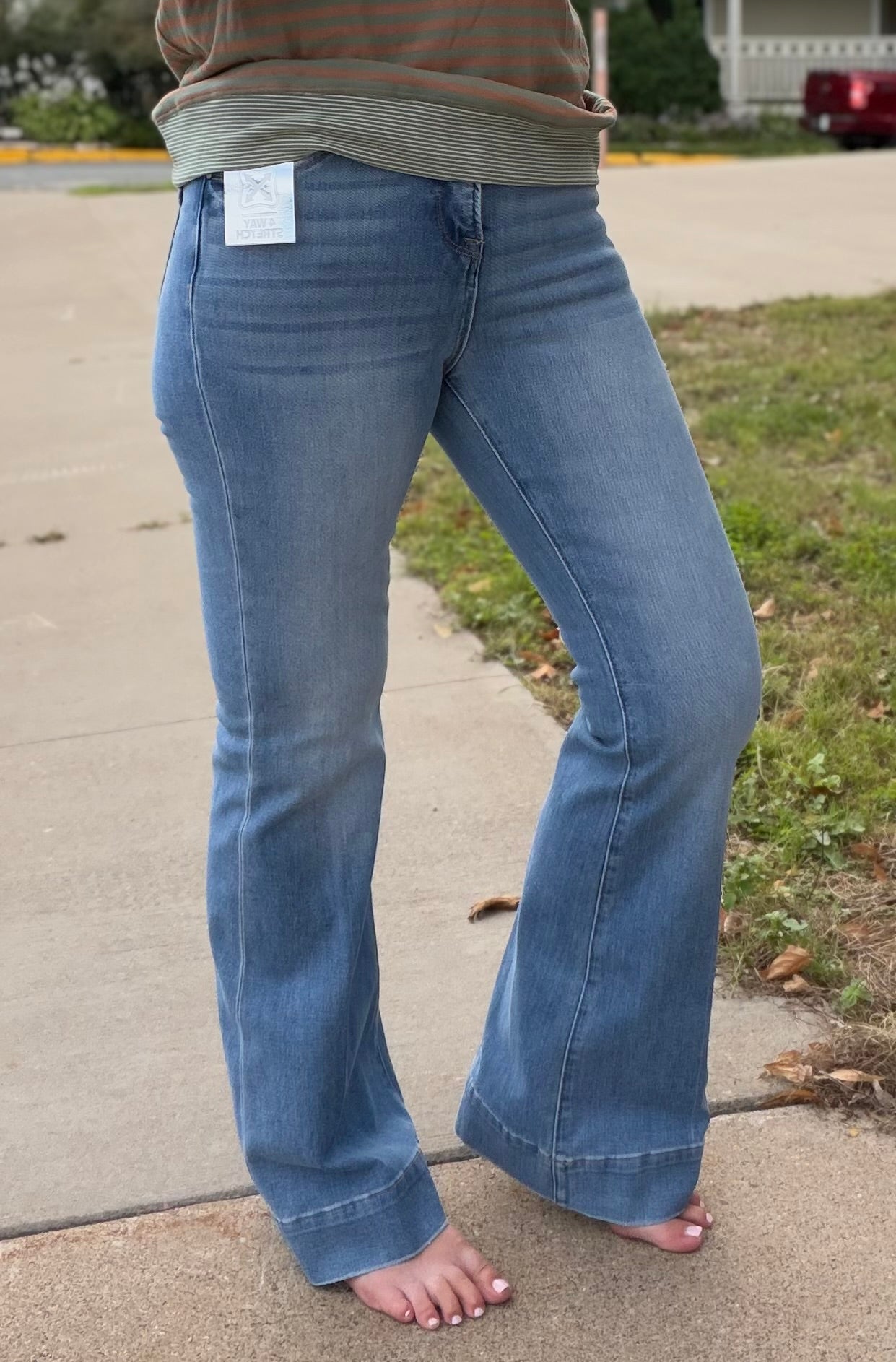 The Stella Mid Rise Tummy Control 4 Way Stretch Flare Jeans by Risen
