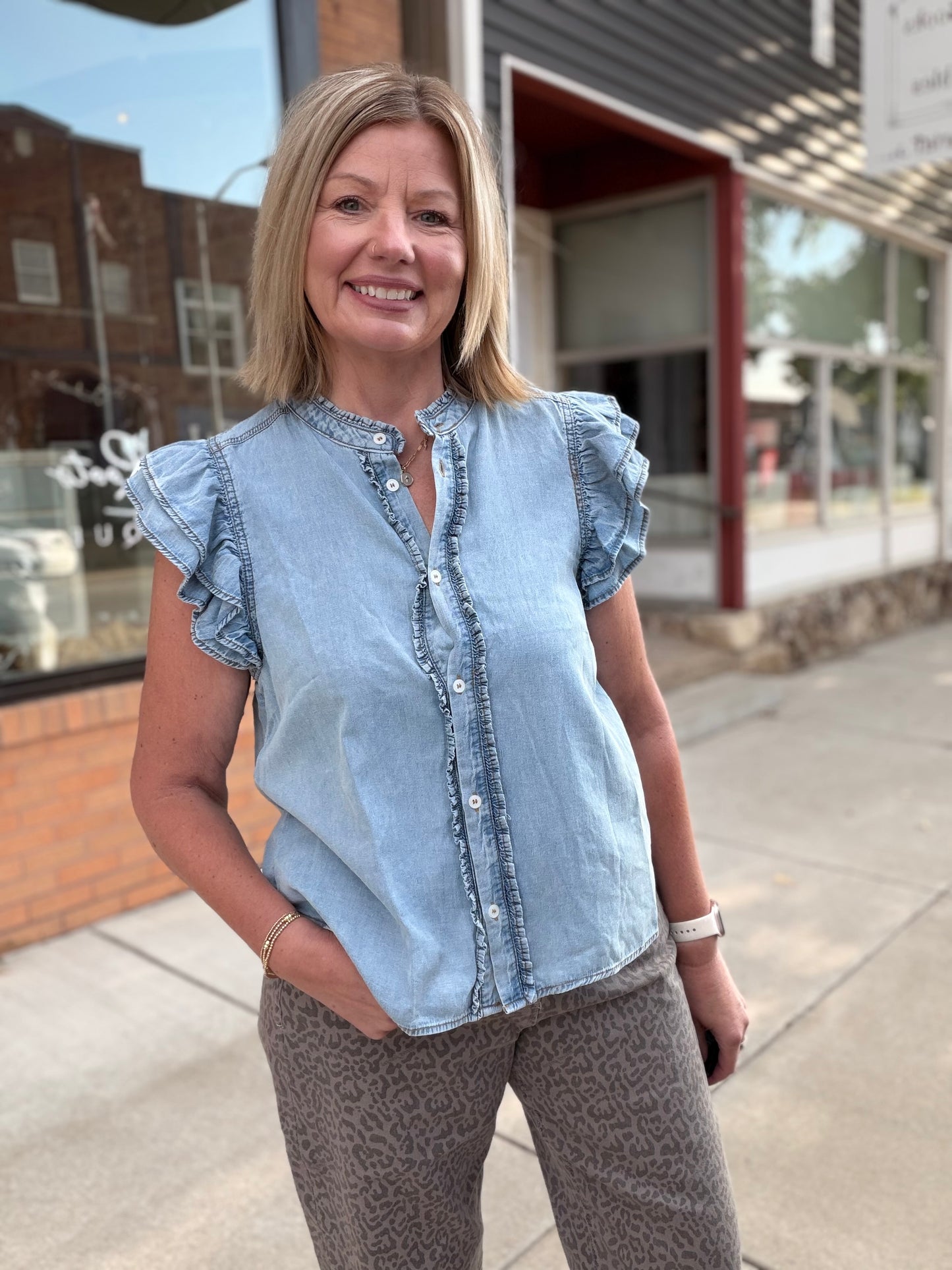 The Faye Washed Denim Ruffle Top