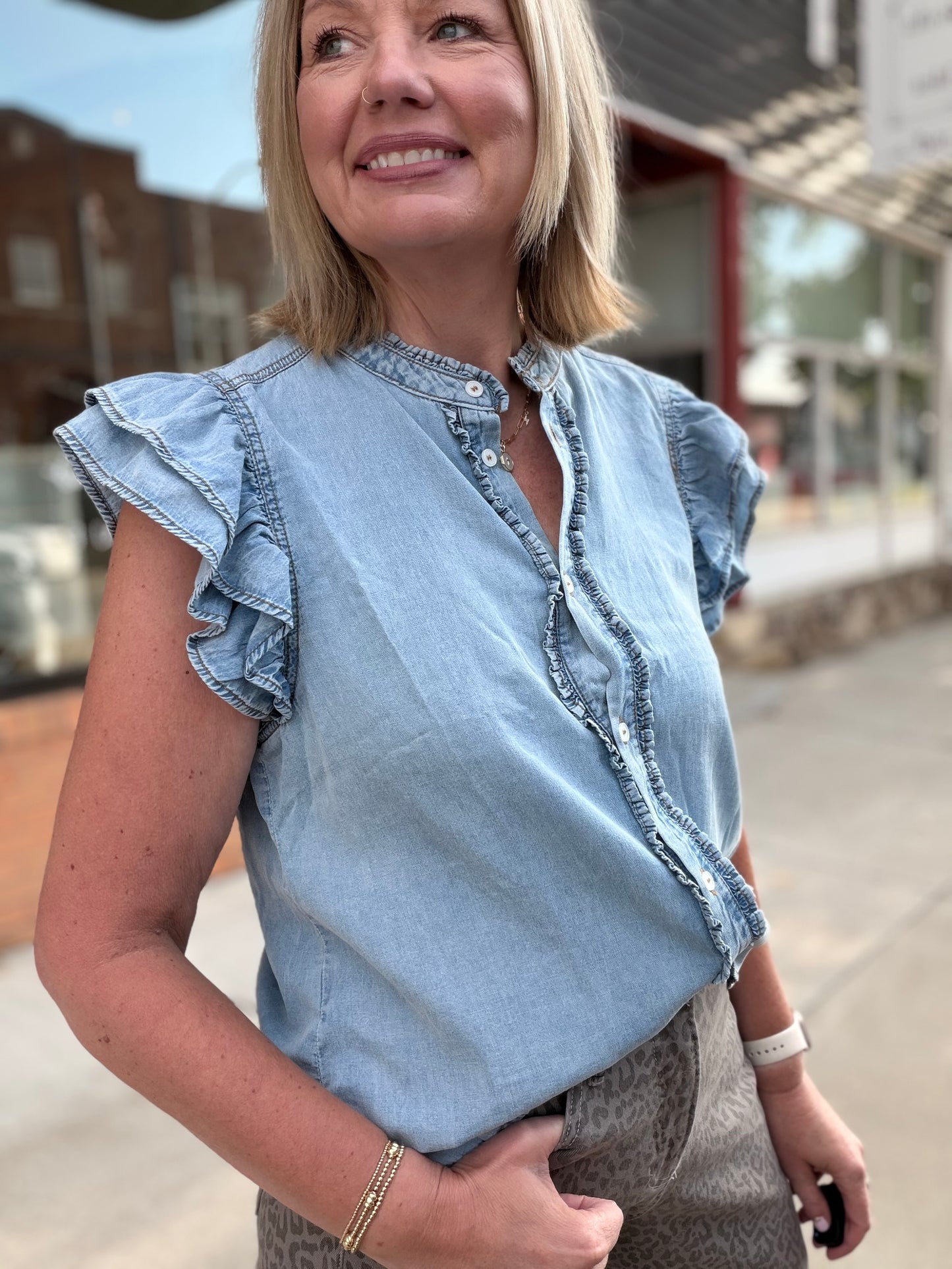 The Faye Washed Denim Ruffle Top