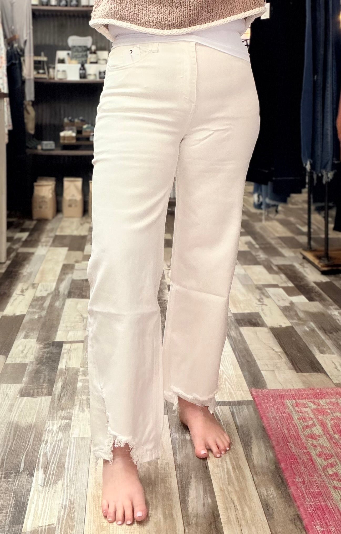 The Lena Asymmetrical Distressed Hem Straight Leg Jeans