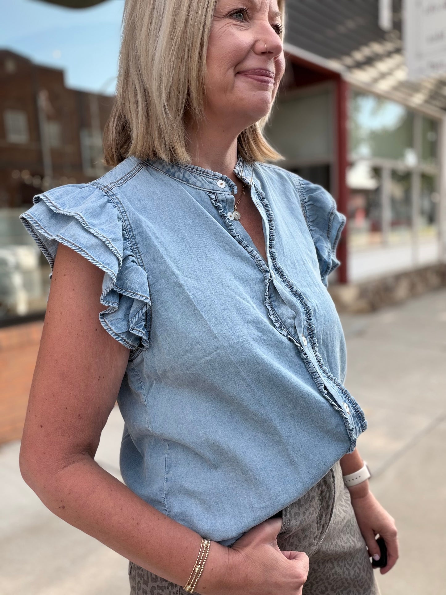 The Faye Washed Denim Ruffle Top
