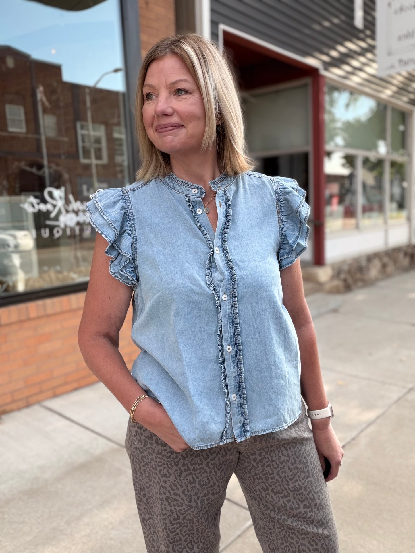 The Faye Washed Denim Ruffle Top