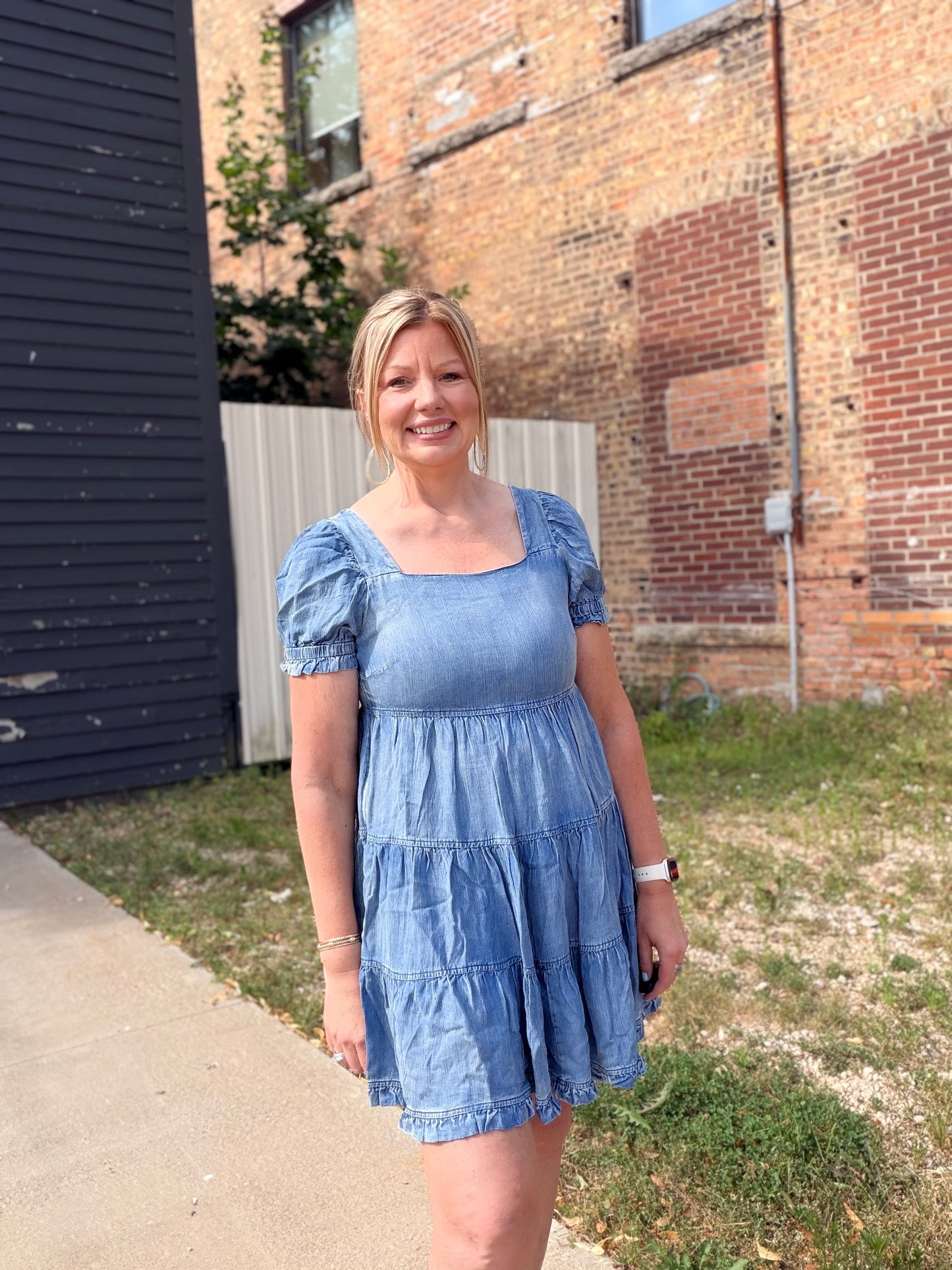 The Ari Chambray Tiered Babydoll Mini Dress