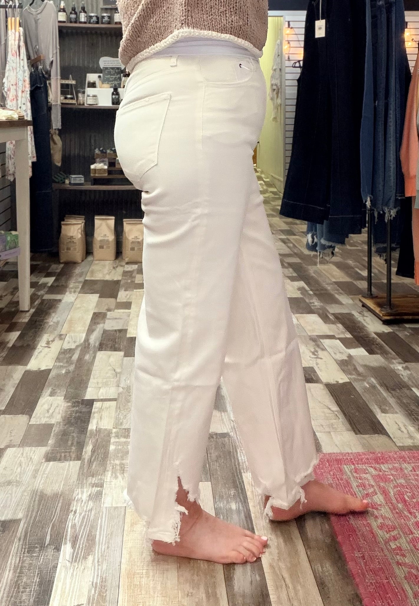 The Lena Asymmetrical Distressed Hem Straight Leg Jeans