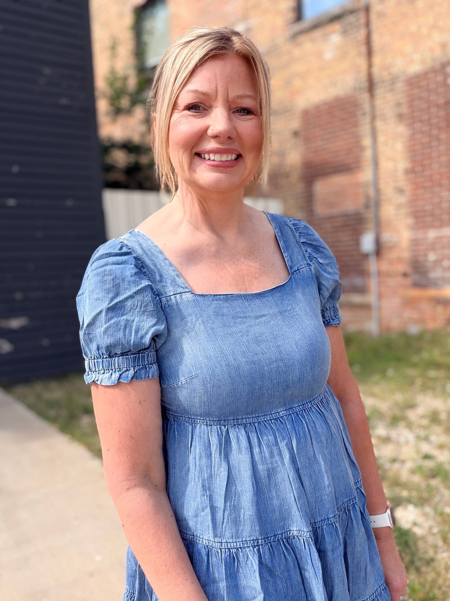 The Ari Chambray Tiered Babydoll Mini Dress