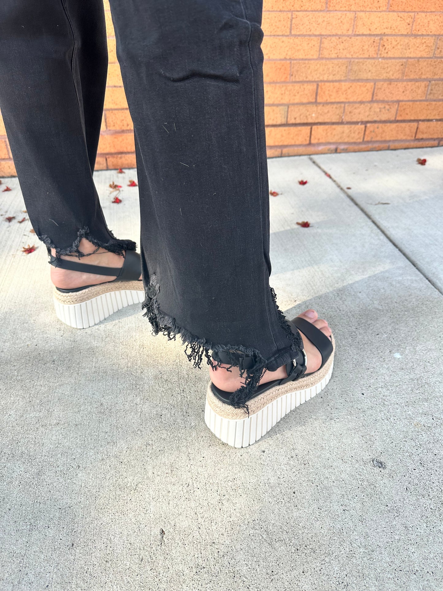 The Lena Asymmetrical Distressed Hem Straight Leg Jeans