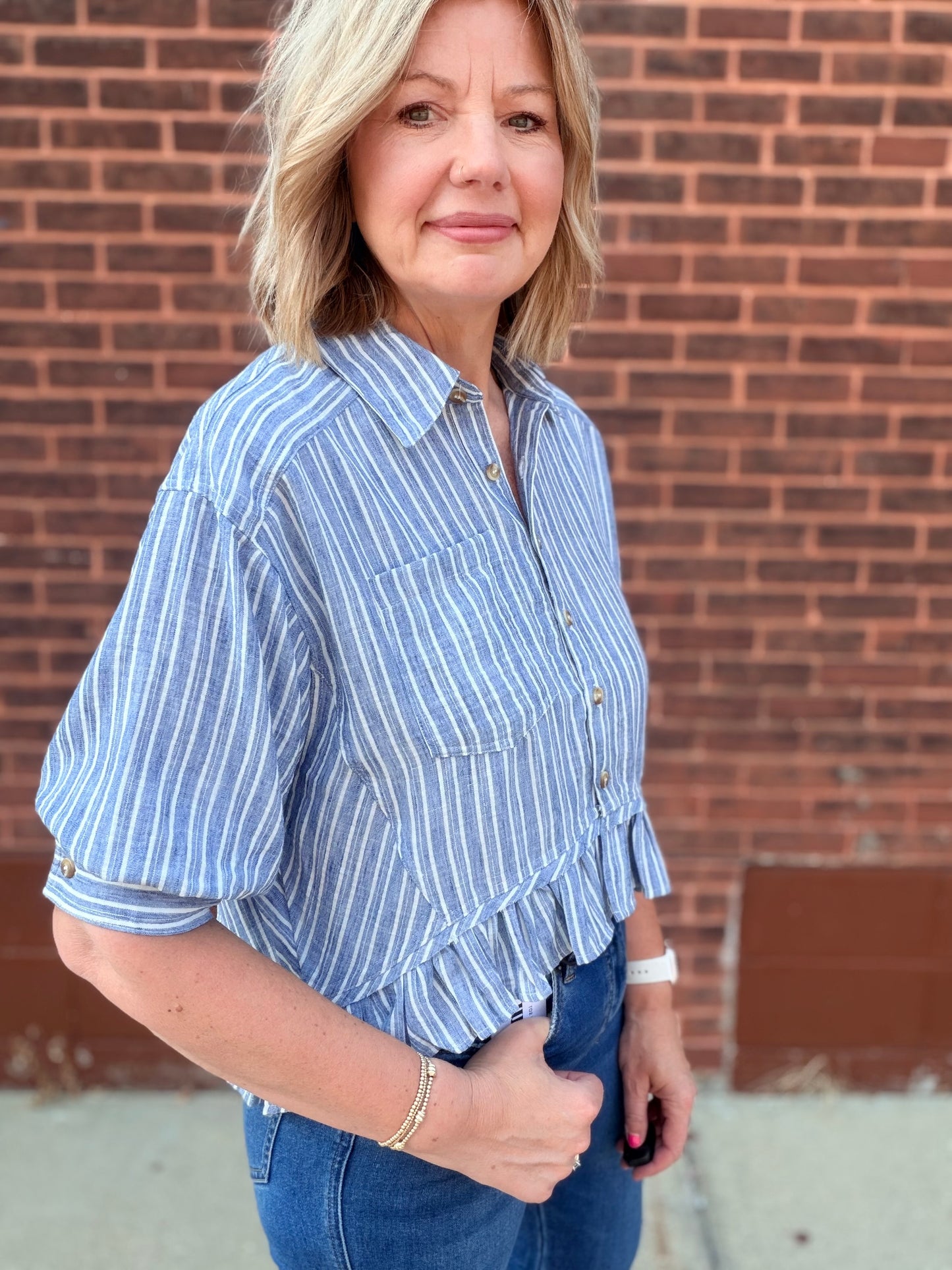 The Laney Striped Button Down Ruffled Hem Shirt